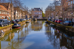 Houses on both sides of canal in Hoorn
