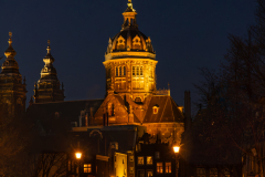 People Out For the Night. St. Nickolas Basilica in the Background.